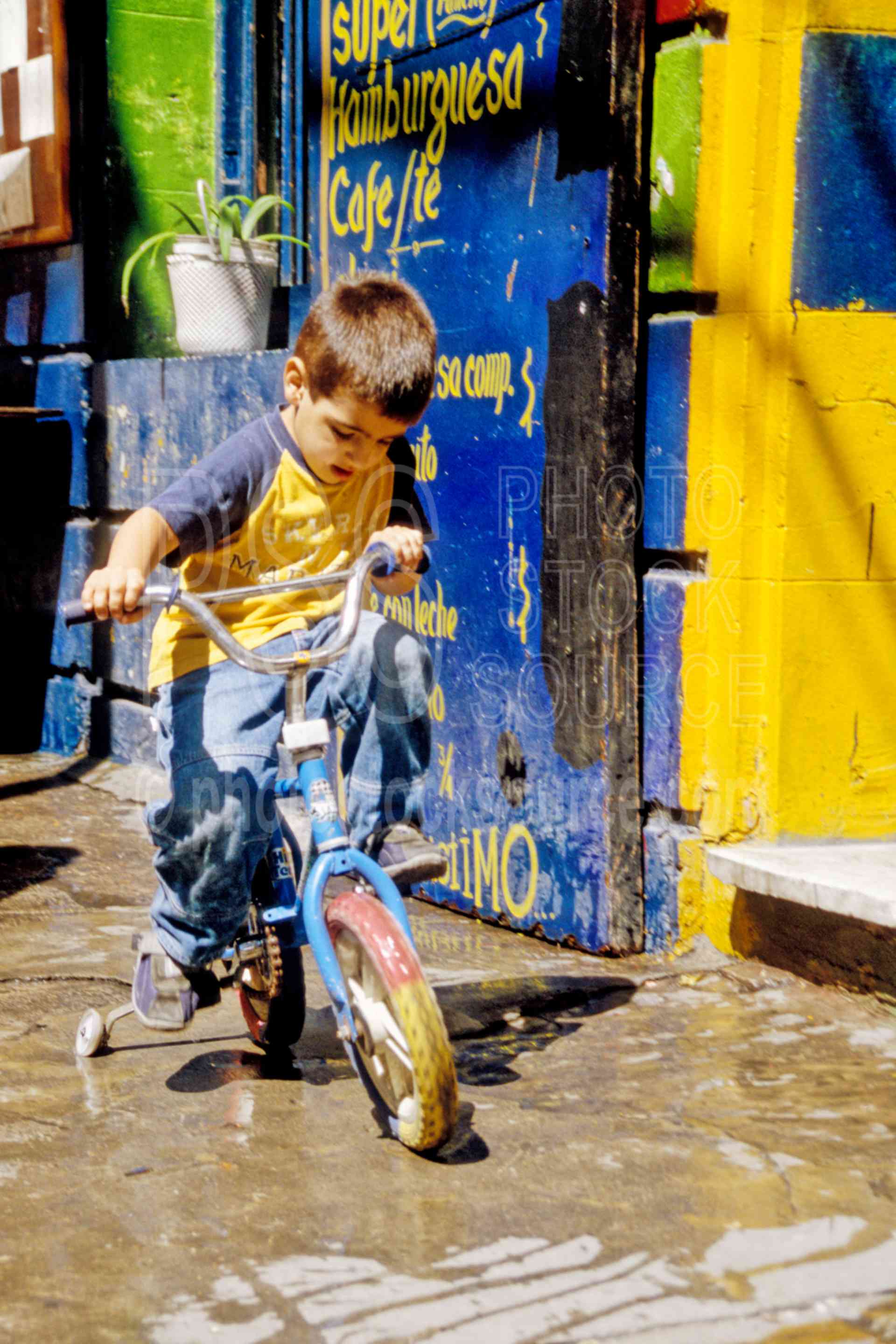 Boy on Training Bike,bike,boys,bicycle,playing,children