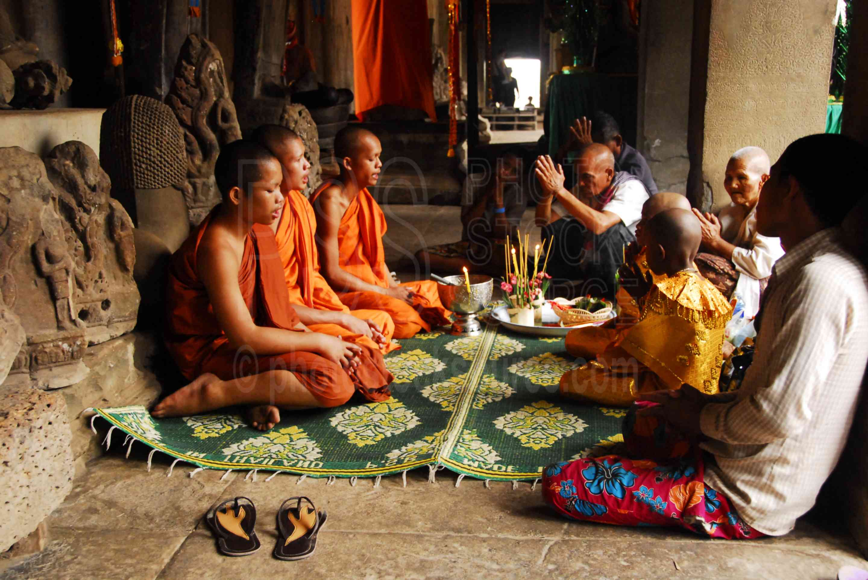 Photo of Buddhist Monks Praying by Photo Stock Source religion, Angkor