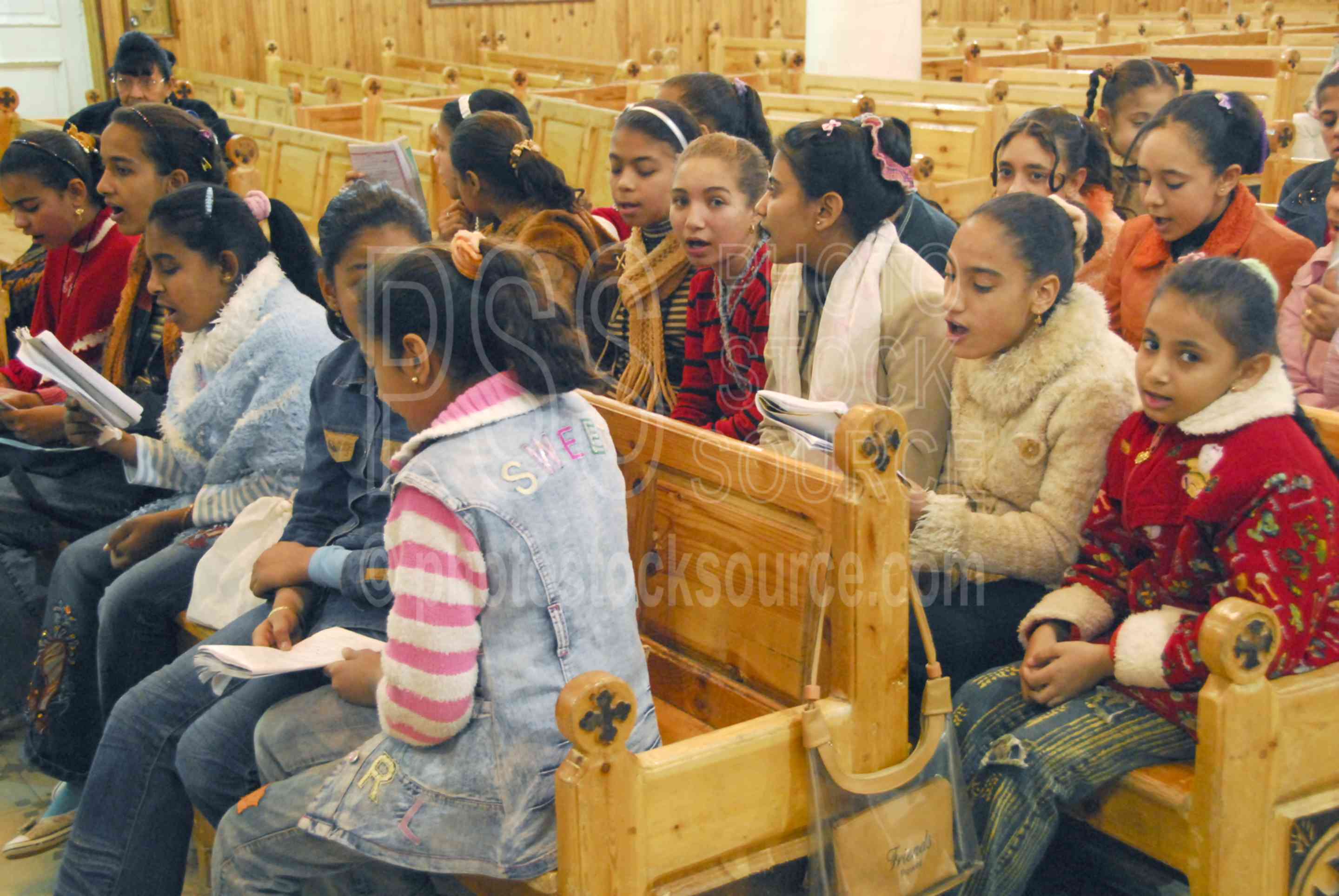 Girl Singers in Church,girl,people,singing,church,choir,churches