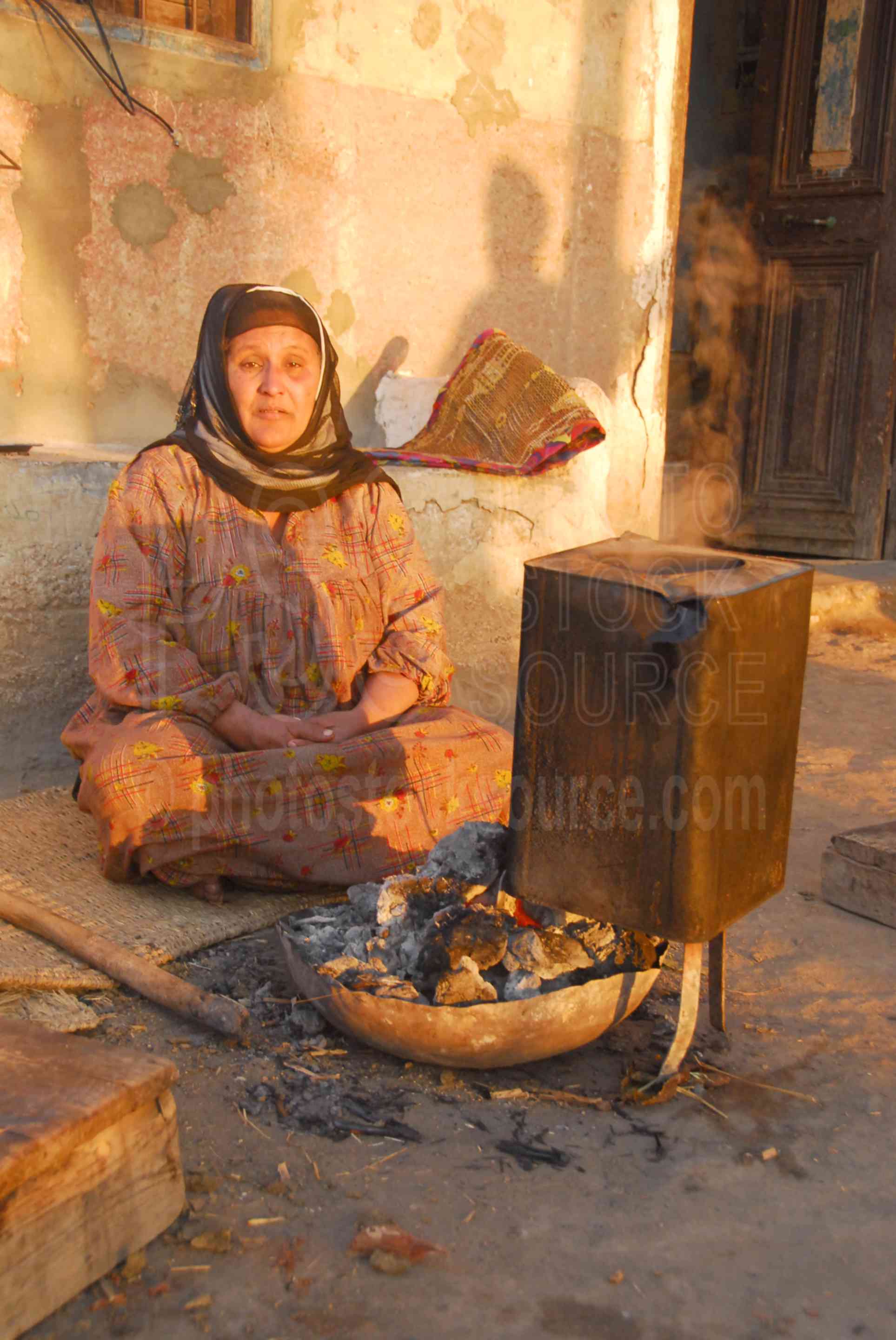 Nubian Cooking Breakfast,sunrise,dawn,daybreak,woman,kitchen,outdoors,morning,baking,cooking,oven