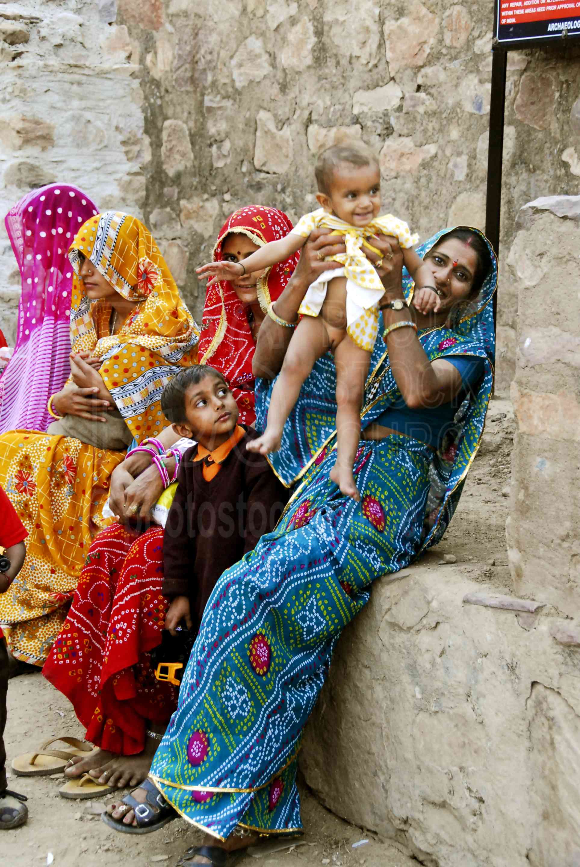 Women in Bright Saris,family,women,child,children,steps,fort,ranthambore,resting