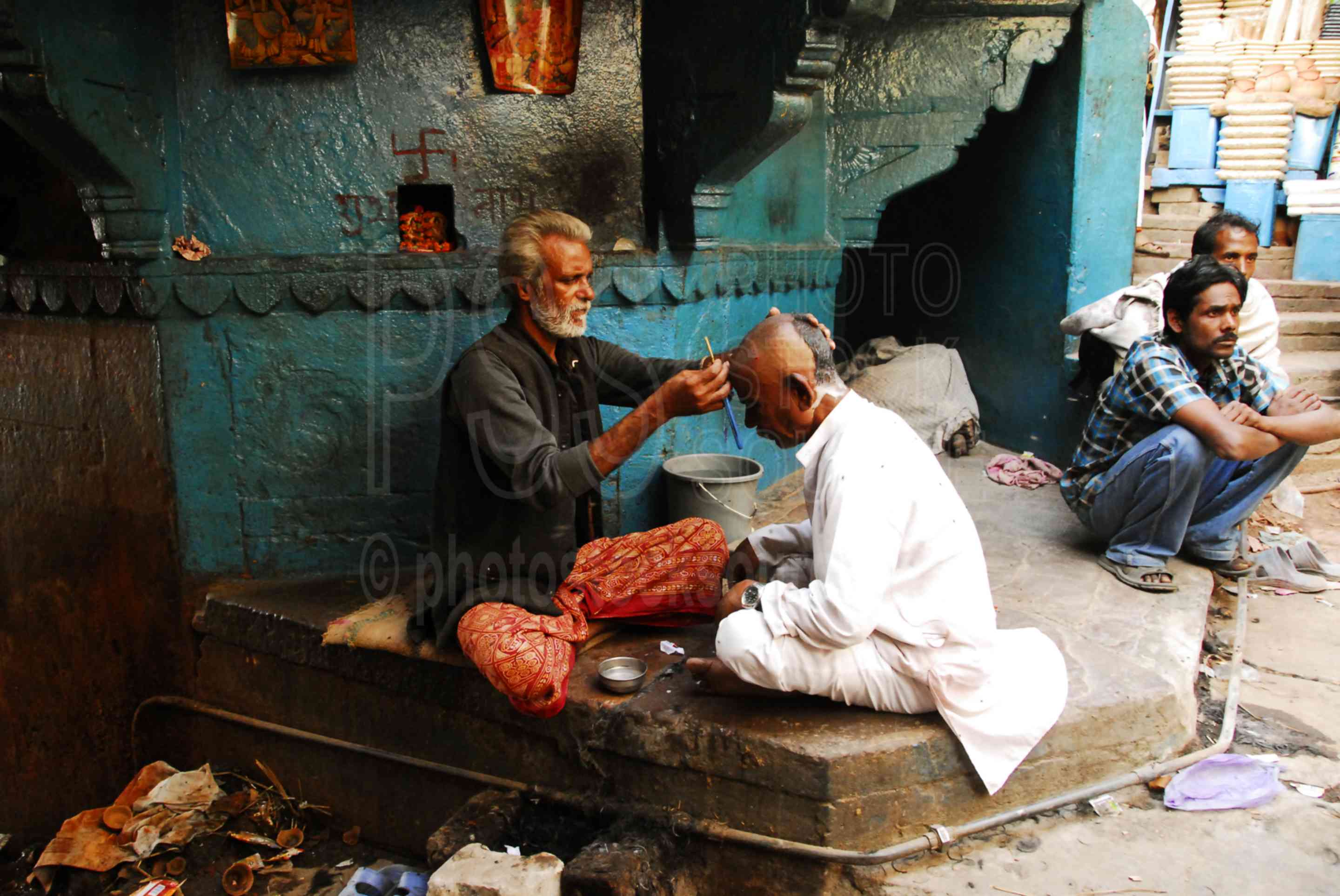 Photo of Ceremonial Head Shaving by Photo Stock Source people, Varanasi