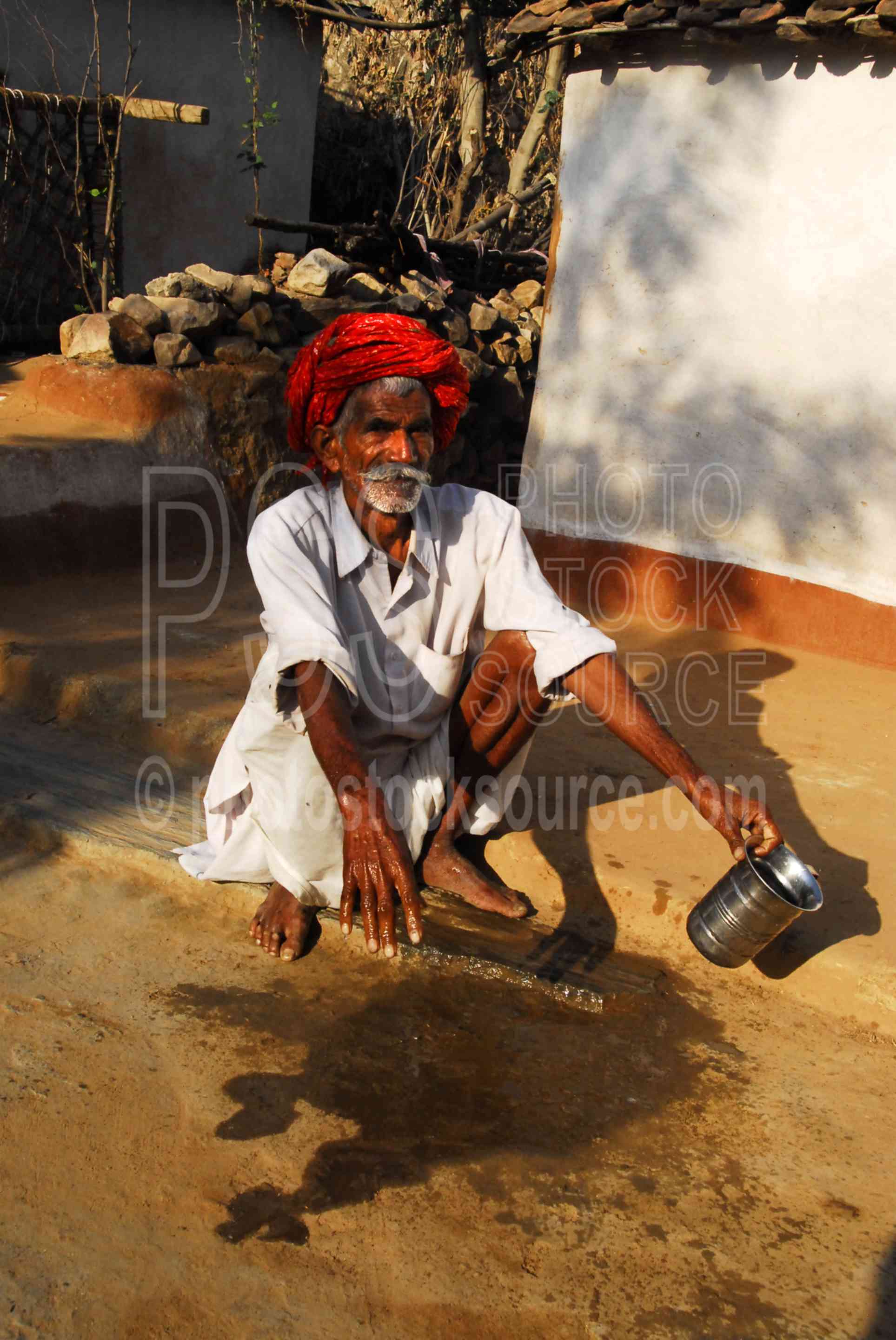 Man Washing,old man,red turban,man,morning,houses,teeth,brushing,cleaning,hygiene,personal hygiene,water