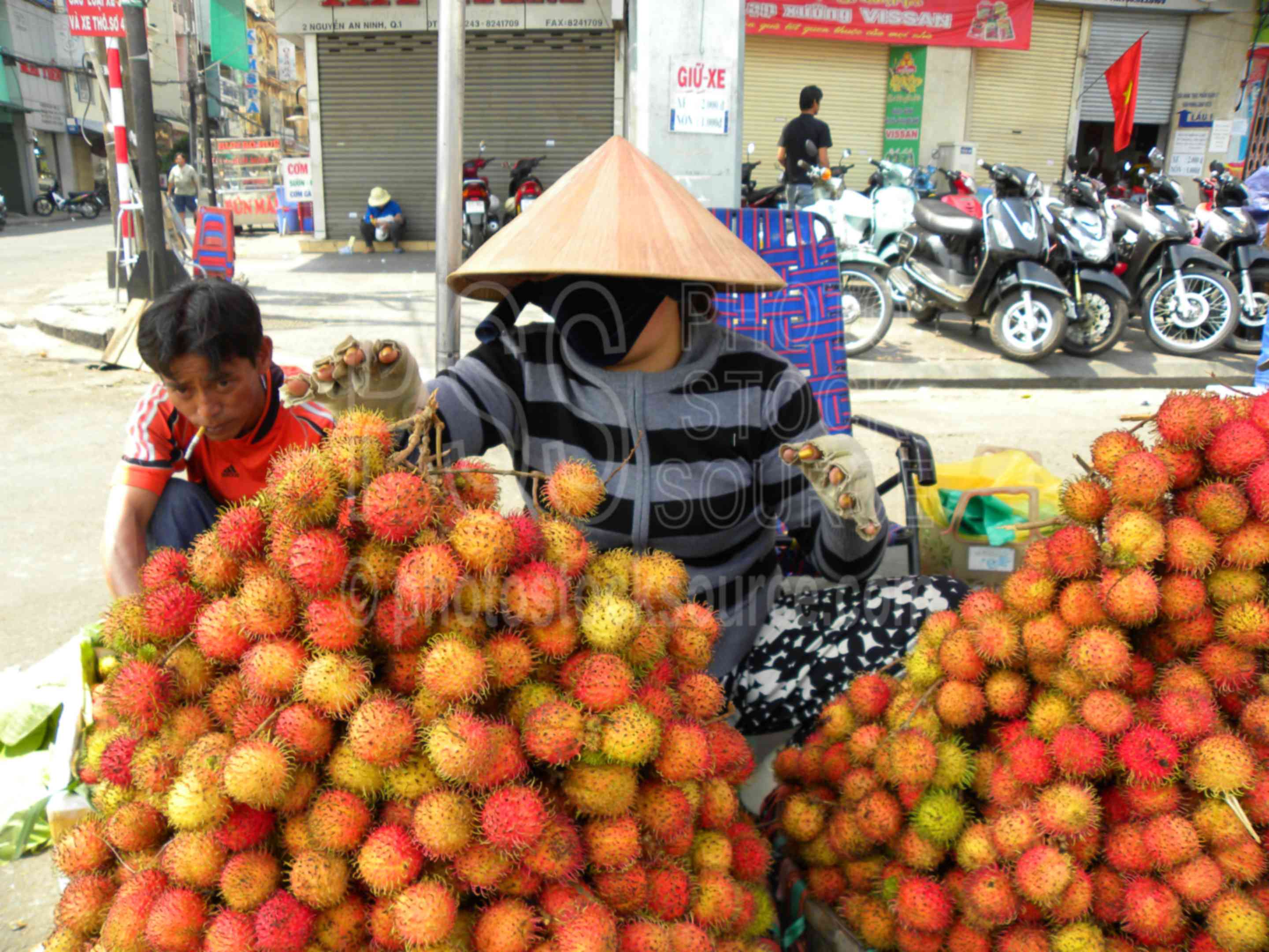 Rambutan (Ngaw) Fruit,city,street,building,market,people,vendor,seller,rambutan,ngaw,fruit