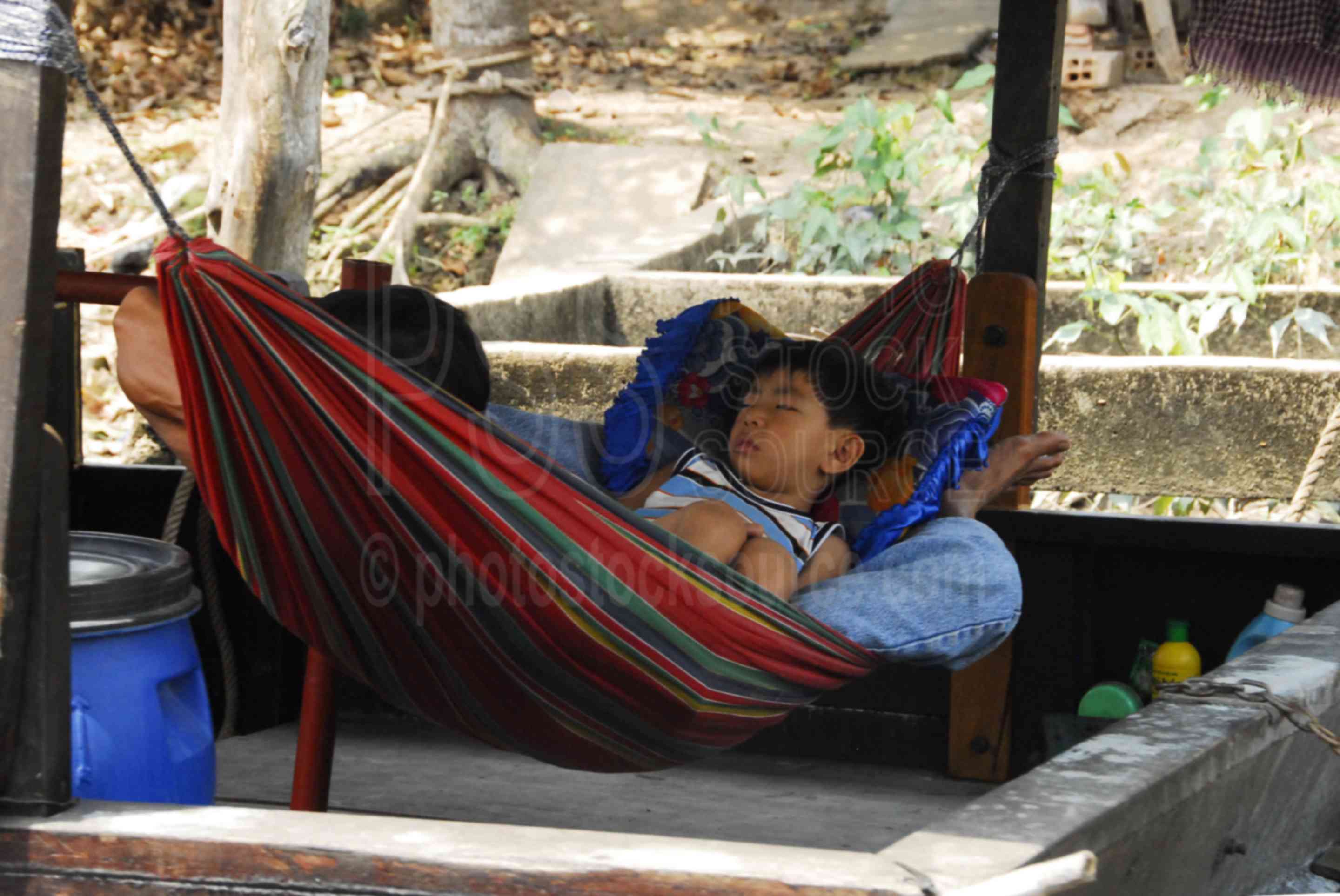 Photo of Boy Sleeping in Hammock by Photo Stock Source people, Vinh